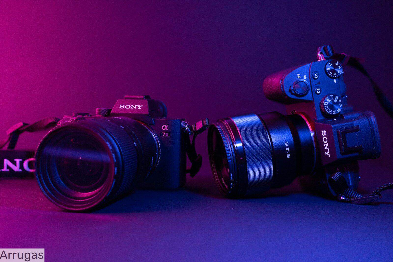 black nikon dslr camera on blue surface
